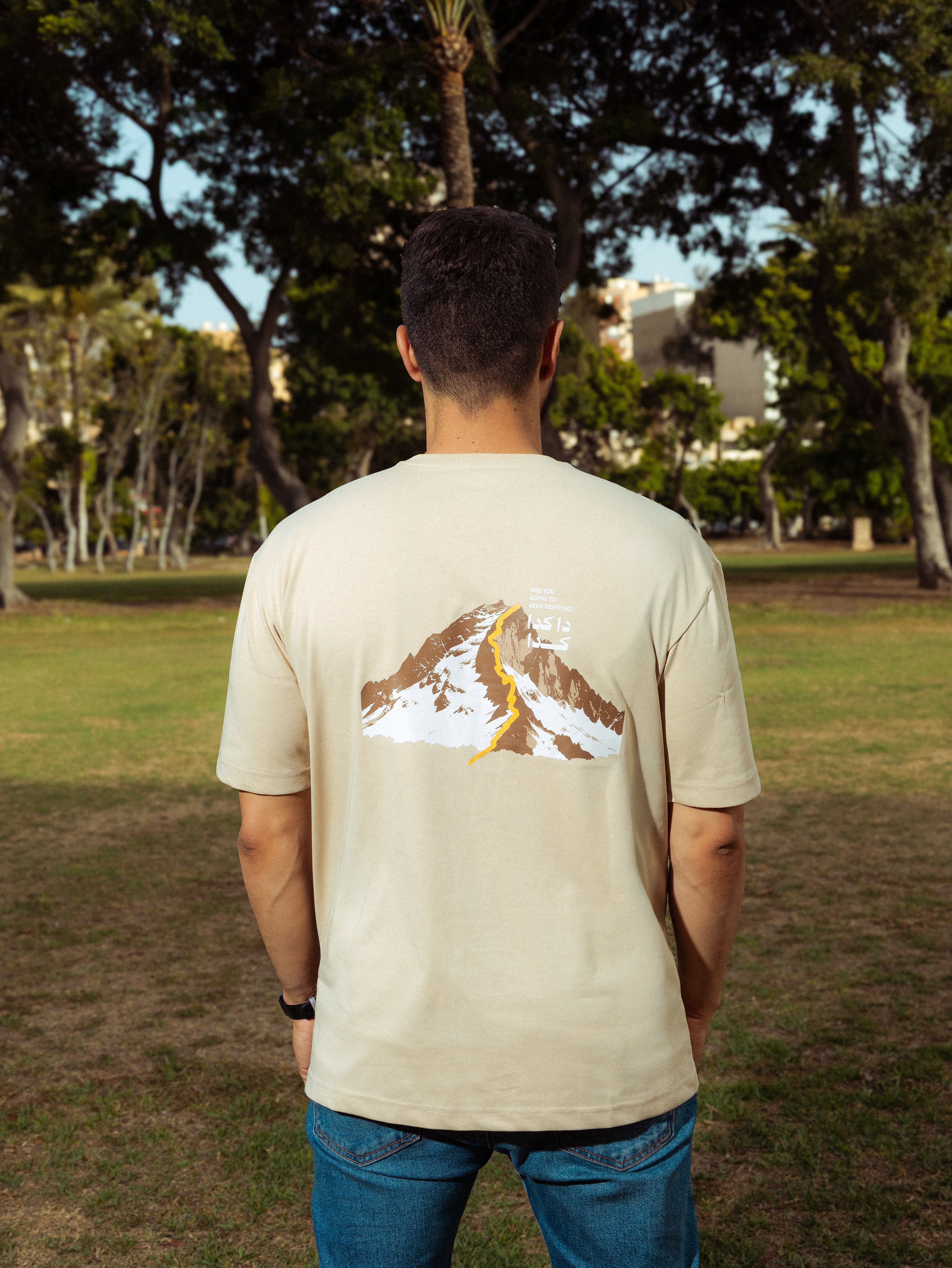 SAAI “DA KDA KDA” OVERSIZED TEE BEIGE