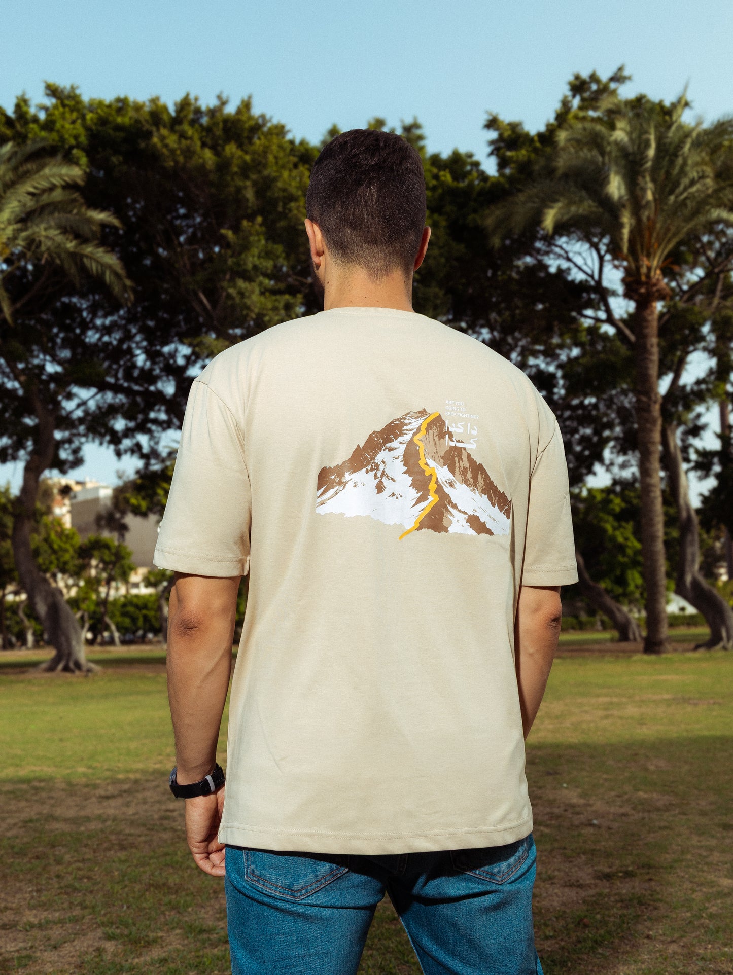 SAAI “DA KDA KDA” OVERSIZED TEE BEIGE